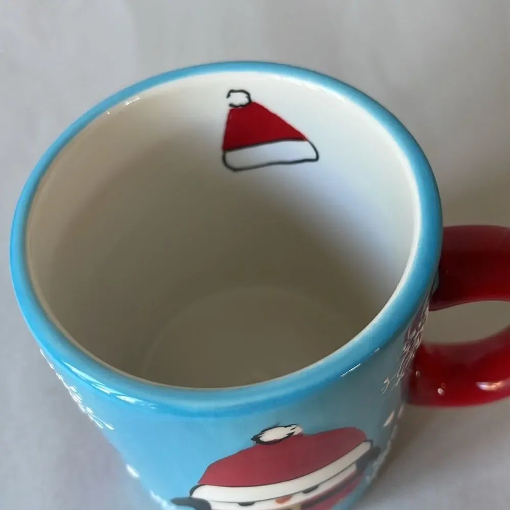 Pier 1 Penguin in Santa Outfit Blue Coffee Mug.
